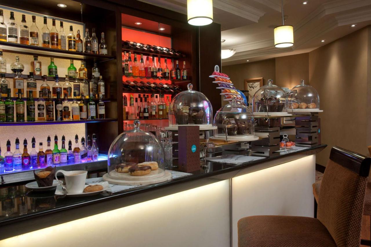 Southern Sun Or Tambo International Airport Kempton Park Exterior photo A coffee bar in a hotel