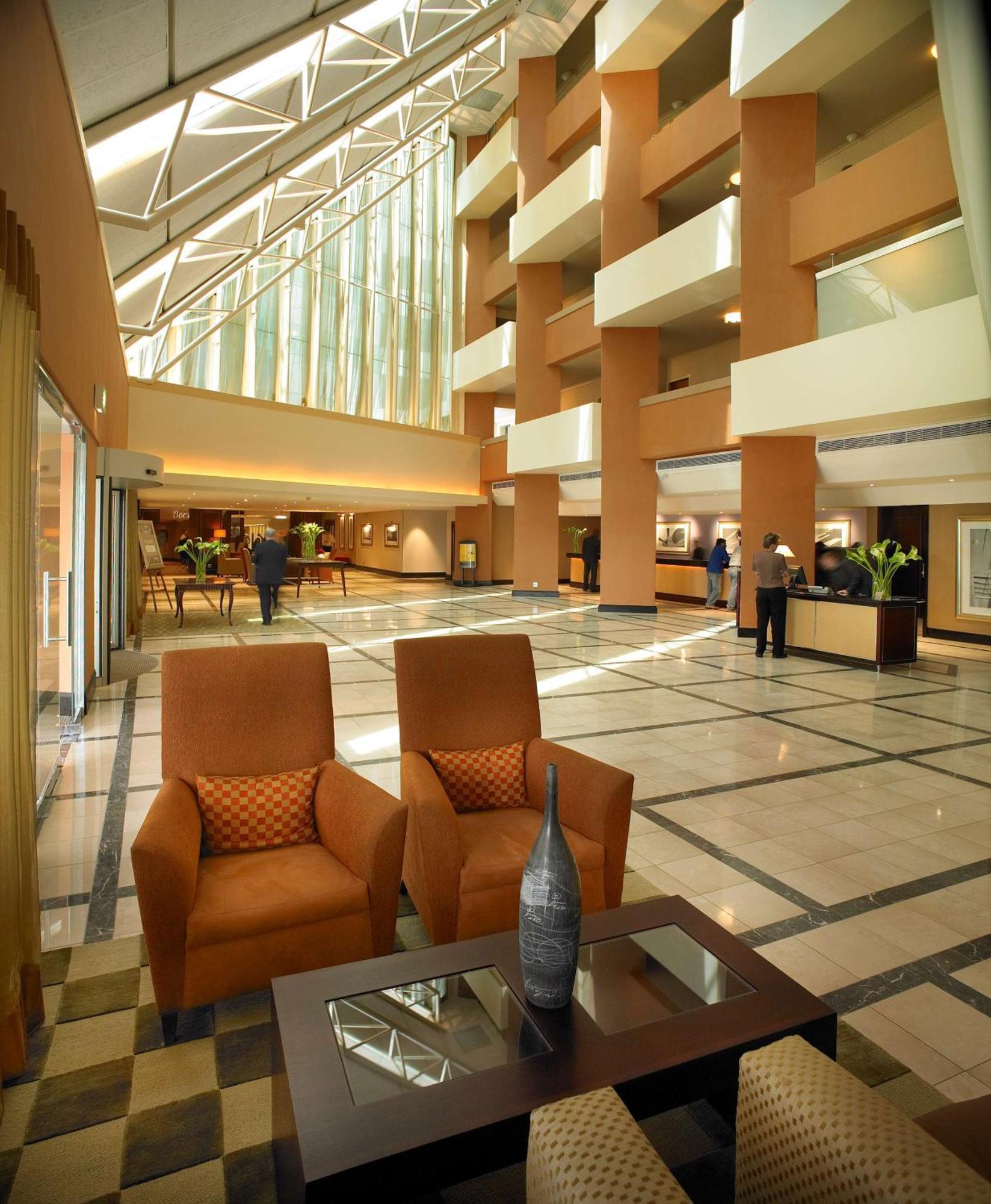 Southern Sun Or Tambo International Airport Kempton Park Exterior photo The reception area of the hotel